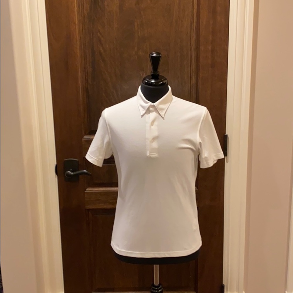 UNIQLO white polo shirt 57% cotton 43% Nylon